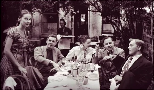 The cafe Nicholson in 1949. Gore Vidal, Tennessee Williams are seated on the right, and Edna Lewis stands in the background.
